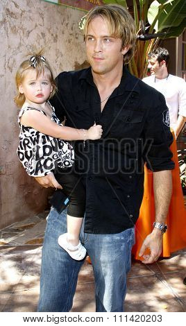 Larry Birkhead and daughter Dannielynn attend the Simpsons Ride Opening Celebration Party held at the Universal Studios Hollywood in Universal City, California, United States on May 17, 2008. 
