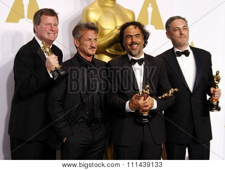 James W. Skotchdopole, Alejandro Gonzalez Inarritu, John Lesher and Sean Penn pose in the press room during the 87th Annual Academy Awards at Loews Hollywood Hotel on February 22, 2015 in Hollywood.