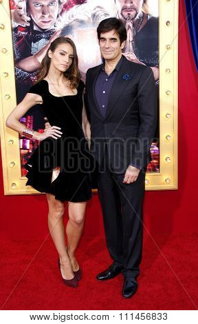 David Copperfield and Chloe Gosselin at the Los Angeles premiere of 'The Incredible Burt Wonderstone' held at the TCL Chinese Theater in Los Angeles, United States, 11/03/2013. 