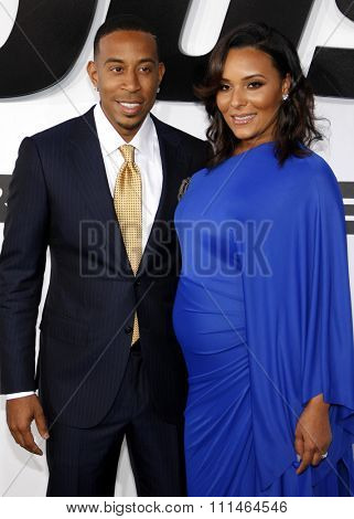 Chris 'Ludacris' Bridges and Eudoxie Agnan at the Los Angeles premiere of 'Furious 7' held at the TCL Chinese Theatre IMAX in Hollywood, USA on April 1, 2015. 