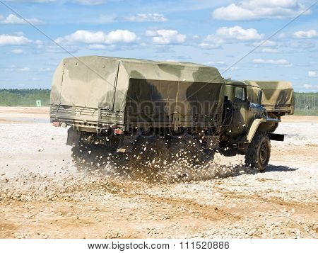 Military truck Ural 4320 makes skid