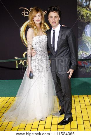 Taylor Bagley and Zach Braff at the 'Oz The Great And Powerful' Los Angeles Premiere at the Dolby Theater on April 10, 2013 in Hollywood, California.  