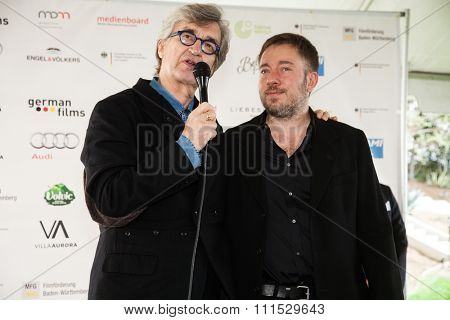 Wim Wenders and Juliano Salgado at the Consulate General of the Federal Republic Of Germany's German Oscar nominees reception held at Villa Aurora in Pacific Palisades on February 21, 2015.