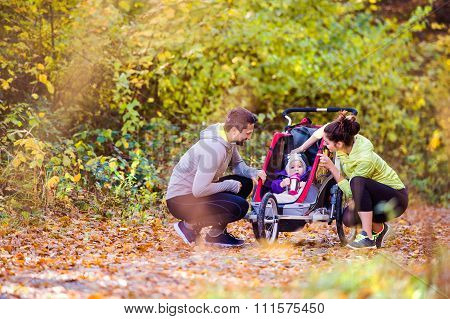 Young Family Running