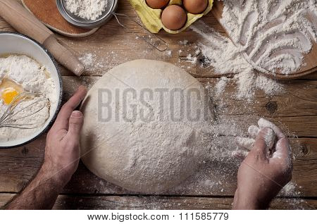 Male Baker Prepares Bread
