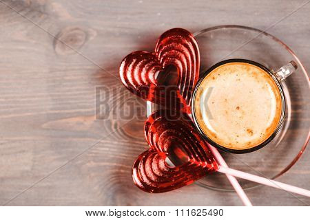 Red heart-shape lollipops