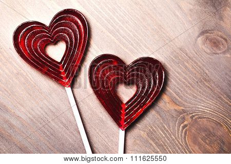 Red heart-shape lollipops