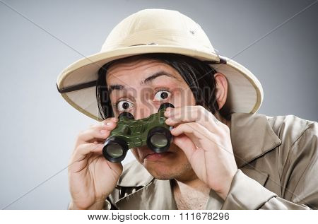 Funny safari traveller in travelling concept