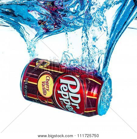 MOSCOW, RUSSIA-APRIL 4, 2014: Can of Dr Pepper Cherry Vanilla soft drink in water. Dr Pepper is a soft drink marketed as having a unique flavor. The drink was created in the 1880s.