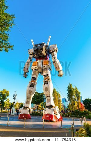 Full size Gundam Performances Outside DiverCity Tokyo Plaza, Odaiba, Tokyo, Japan - 27 November 2015: It is 18m tall The sculpture of famous anime franchise robot, Gundam.