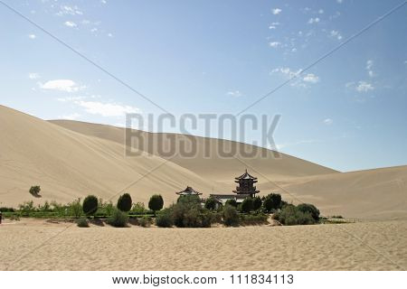 Crescent lake in Mingsha Shan (Echo Sand Mountain) Dunhuang China