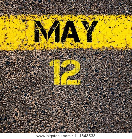 12 May Calendar Day Over Road Marking Yellow Paint Line