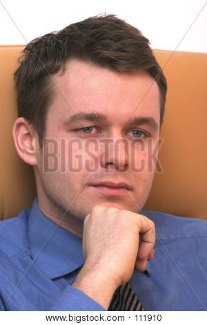 Thoughtful Listening  Young Businessman