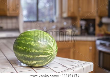 Watermelon on a Countertop in a Home Kitchen