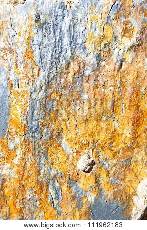 Rocks Stone And   Orange Gneiss In The Wall Of Morocco