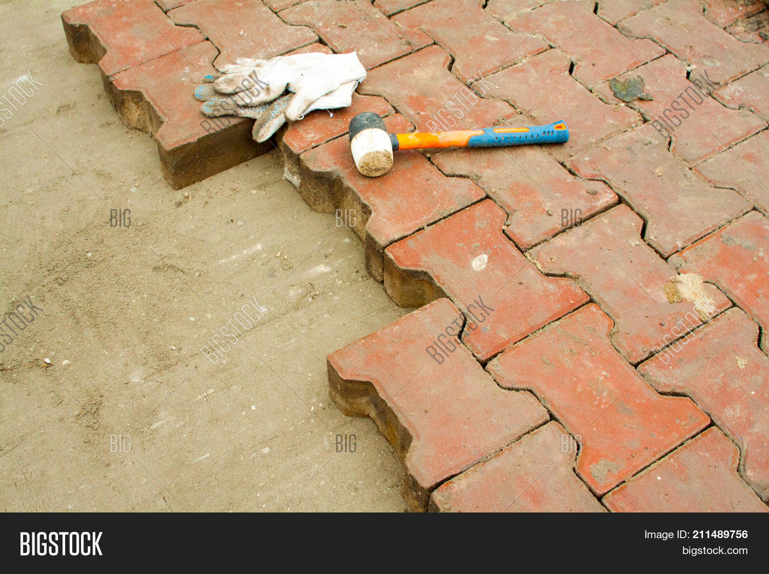 Laying Paving Slabs By Image Photo Free Trial Stock Laying Paving Slabs By Mosaic Close Up Repairing Sidewalk Workers Stone