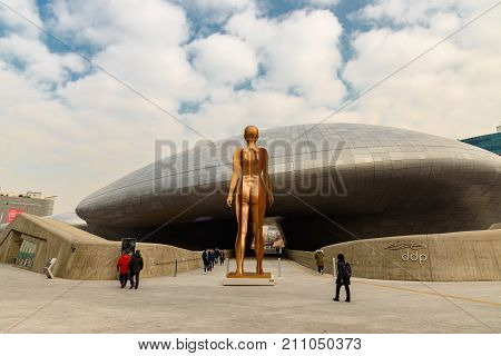 People Walking Near The Entrance Of Dongdaemun Design Plaza In Seoul