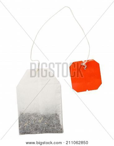 Teabag with red label isolated on a white