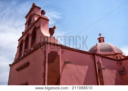 February 26 2016 Bernal Queretaro Mexico: colourful colonial church building in the center of the small tourist town