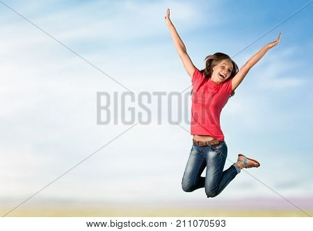 Happy woman jamping fun background sky beautiful