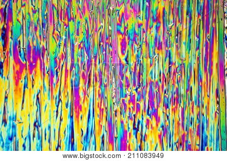 microscopic shot of urea micro crystals in polarized light