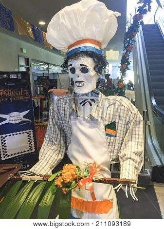 XALAPA, VERACRUZ, MEXICO- NOVEMBER 27, 2017: Skull dressed as a chef at a Day of the Dead festival in Xalapa, Veracruz, Mexico