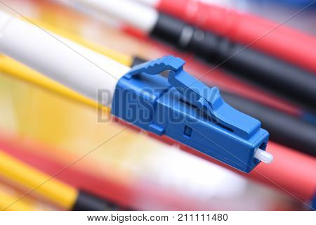 Fiber optic cable plug type LC, close up, concept of high speed internet network