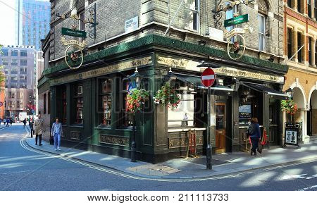 LONDON, UK-AUGUST 11, 2017: The traditional English pub Adam and Eve in North London near Oxford Circus and Tottenham Court Road stationon.