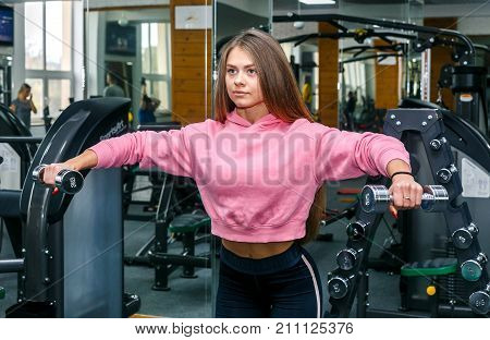 GRODNO BELARUS - OCTOBER 24 2017.Beautiful girl is engaged in a gym