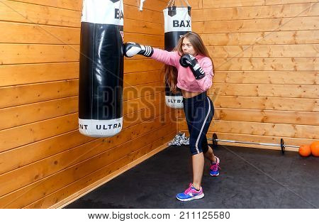 GRODNO BELARUS - OCTOBER 24 2017.Beautiful girl is engaged in a gym