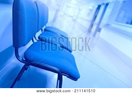 Tedious waiting in the hospital hallway. Conceptual photo
