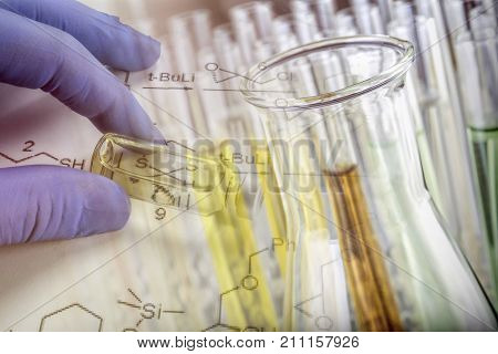 Several Test Tubes And Glass Of Precipitation In A Laboratory