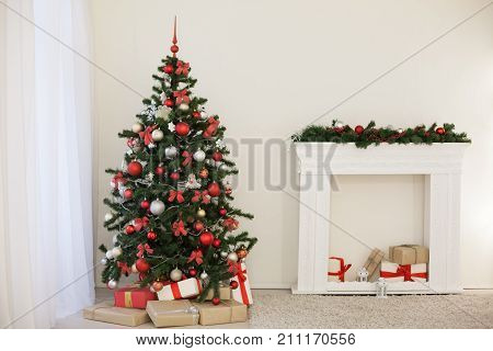 room decorated for the Christmas holidays new year tree gifts 2018 2019