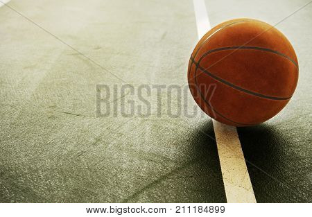 brown orange old vintage basketball on indoor gymnasium indoor sport green floor with white line background