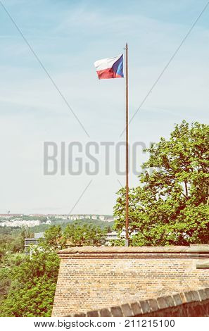 Czech flag on the Spilberk castle Brno southern Moravia Czech republic. State symbol. Yellow photo filter.
