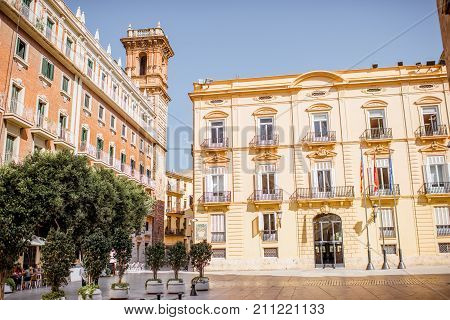 View on the Manises square with Bartolomeu tower in Valencia city in Spain