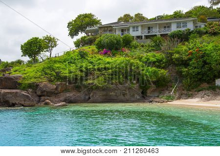 Antigua, Caribbean islands - May 20, 2017: English Harbour view with Galeon beach and villa on the rock