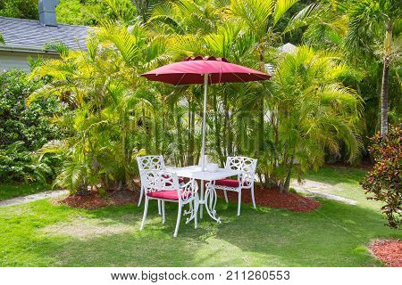 Antigua, Caribbean islands - May 20, 2017: Chairs and table in the English Harbour, Galeon beach