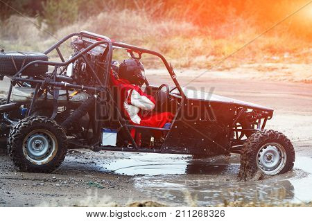 Buggy Car In The Sunlight. Driver With The Second Assistants In The Car Buggy Ride. Riding  Buggy
