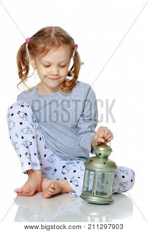 Sad little girl concept of the meaning of life and psychological adaptation of the child in the family and society. Isolated over white background