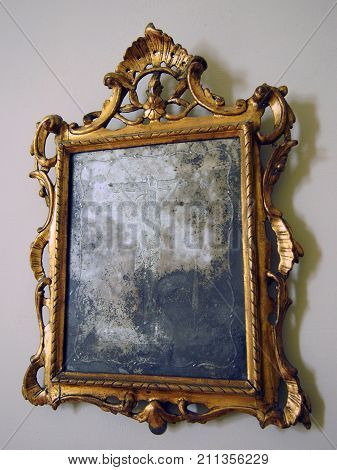 Old Tarnished Gold Framed Mirror With Ornate Baroque Details