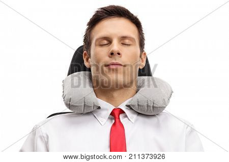 Formally dressed guy sleeping with a neck pillow isolated on white background