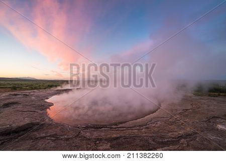 Lake in the geothermal valley. Place near the Strokkur geyser. Tourist attraction of Iceland. The Polar Day