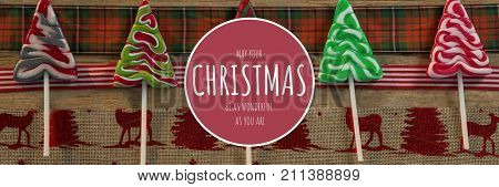 Digital composite of merry Christmas text on Christmas background
