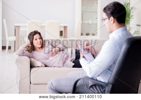 Pregnant woman visiting psychologist doctor