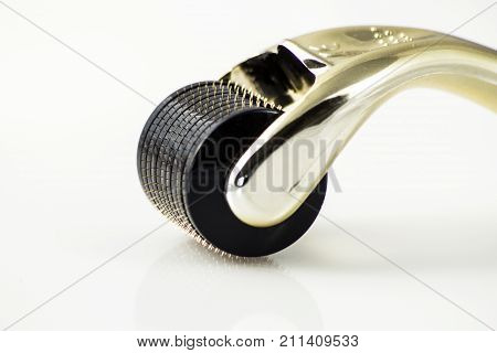 Derma roller for medical micro needling therapy. Tool also known as: Dermaroller, mesoroller, meso-roller, mesopen.