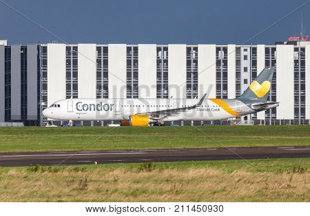 LANGENHAGEN / GERMANY - OCTOBER 28 2017: Airbus A 321 from airline Condor drives on airport to the runway.
