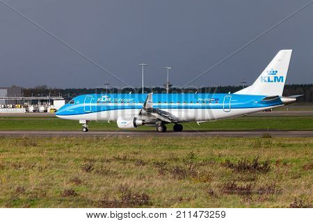LANGENHAGEN / GERMANY - OCTOBER 28 2017: Embraer ERJ-175 from airline KLM lands on international airport Langenhagen / Hanover.