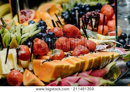 catering services background with fruits and berry in restaurant