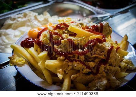 Amazing French Fries With Cheddar Cheese and Egg